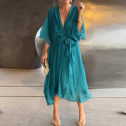 Bohemsk Maxikjole med V-hals – Løs Passform, Uregelmessig Skjørt og Knyting i Midjen