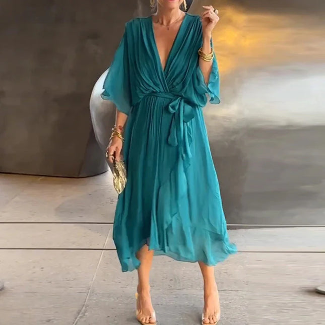 Bohemsk Maxikjole med V-hals – Løs Passform, Uregelmessig Skjørt og Knyting i Midjen