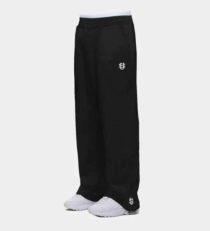 Trendy Joggebukser for Menn og Kvinner – Løse Wide Leg Sweatpants med Brodert Logo og Lommer | Streetwear & Komfort i Ett