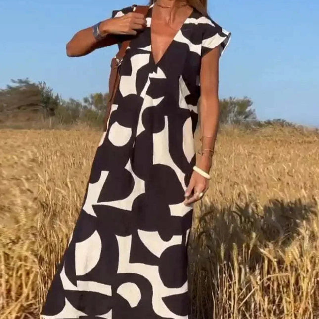 Bohemsk Maxikjole med Vintageprint – Ermeløs Sommerkjole med Høyt Liv