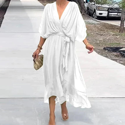 Bohemsk Maxikjole med V-hals – Løs Passform, Uregelmessig Skjørt og Knyting i Midjen